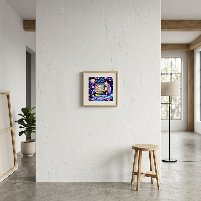 May include: A square framed art print featuring a vibrant cosmic scene with swirling purple, blue, and pink nebula clouds, scattered yellow stars, and a central circular window revealing a colorful, stylized character illustration against a dark background.