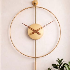 Moderne Gold Wanduhr mit dekorativen Pendel 84 cm, skulpturale minimalistische Statement Wandkunst Bild 3