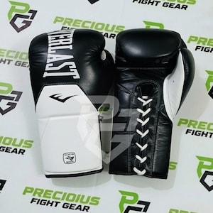 Guantes de boxeo profesionales EVERLAST con cordones premium para entrenamiento | Muay Thai y sparring, hechos con cuero vacuno genuino para los amantes del boxeo.
