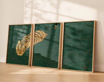 May include: Three framed art prints depicting a tiger swimming in a dark green wavy background. The tiger has gold and orange fur with black stripes. The frames are light wood, and the theme is nature and wildlife. The prints are in cm.