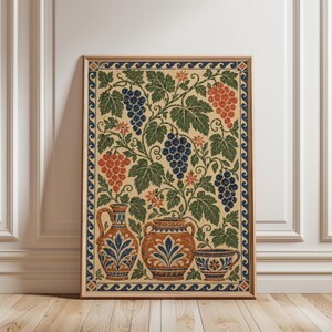 May include: A rectangular wall art print featuring a repeating pattern of grapevines with blue and red grape clusters, green leaves, and small orange flowers. At the bottom, three ceramic vessels are depicted in blue, orange, and cream tones.