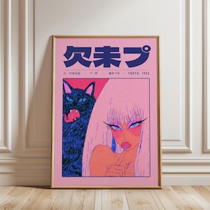 May include: A rectangular wall art print in a wooden frame featuring a pink background with dark blue Japanese text at the top. The illustration depicts a person with long white hair and a black cat with a pink tongue, labeled Tokyo 1923.