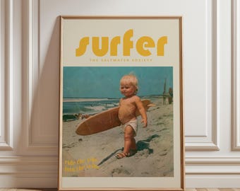 Peut inclure: Affiche encadrée de style vintage avec un enfant sur une plage tenant une planche de surf. Le mot "surfer" en jaune est en haut, avec "The Saltwater Society" en dessous. Le bas de l'affiche indique "Ride the Tide, Join the Tribe".