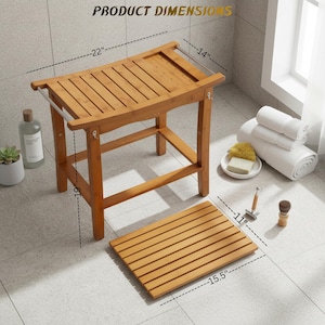 May include: A wooden shower bench with a slatted seat and a matching bath mat. The bench is 22 inches long, 14 inches wide, and 19 inches high. The bath mat is 15.5 inches long and 11 inches wide. The text "PRODUCT DIMENSIONS" is visible.