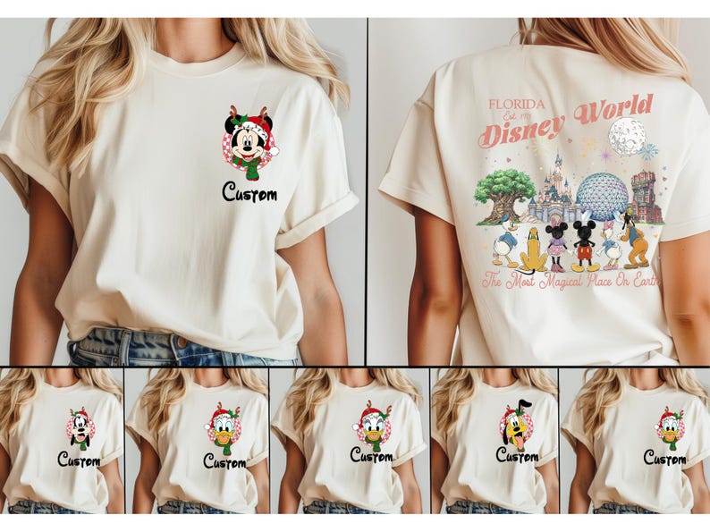 May include: A cream-coloured t-shirt featuring a small graphic on the front left chest of a Disney character in a holiday hat and the word Custom. The back displays a large graphic of Disney World landmarks and characters with the text Florida Est 1971.