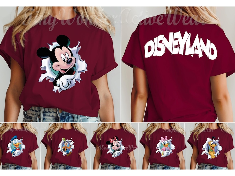 May include: A maroon short-sleeve t-shirt featuring a graphic of Mickey Mouse emerging from a white torn paper effect on the front and the word DISNEYLAND in large white letters on the back, with additional variations showing other characters.