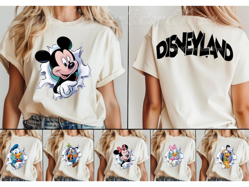 May include: A cream-colored short-sleeve t-shirt featuring a graphic of Mickey Mouse emerging from a torn paper effect on the front. The back of the shirt displays the word DISNEYLAND in bold black lettering. Other versions show characters.