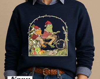 Frog And Toad Riding A Bike Christmas Sweatshirt,Book Christmas Frog Shirt,Christmas Tee,Christmas Gift,Retro Christmas Frog Toddler Sweater