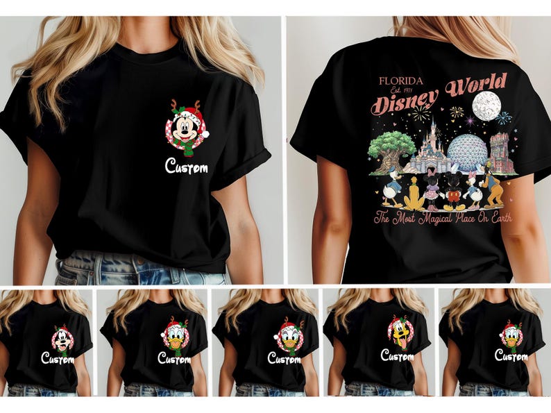 May include: A black t-shirt featuring a small graphic on the front left chest of a character in a Christmas wreath with the word Custom below it. The back displays a large Disney World graphic with characters, landmarks, and the text The Most Magical Place On Earth.
