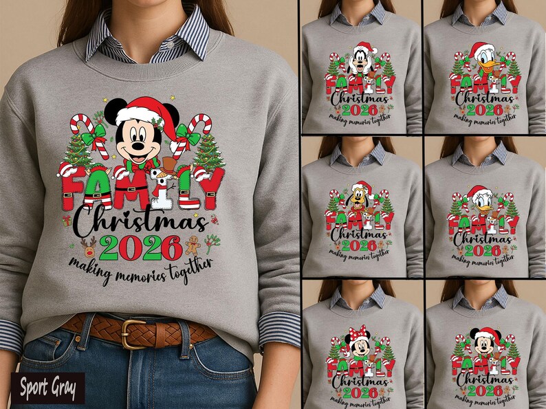 May include: A sport gray crewneck sweatshirt featuring a graphic print of Disney characters wearing Santa hats, surrounded by Christmas trees and candy canes. The text reads Family Christmas 2026 making memories together in red, green, and black.