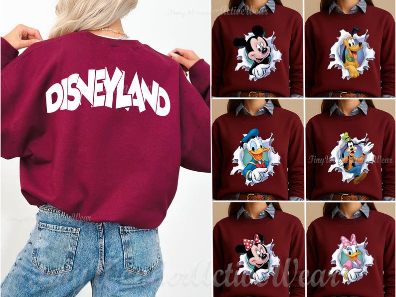 May include: A maroon long-sleeve sweatshirt featuring the word DISNEYLAND in large white letters on the back. The front displays various Disney character graphics, including Mickey Mouse, Pluto, Donald Duck, Goofy, Minnie Mouse, and Daisy Duck.