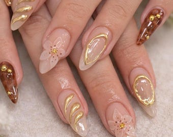 24 künstliche Fingernägel zum Aufkleben – mit floralem/glänzendem/goldenem Design, edel und elegant, wiederverwendbar.