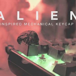 Alien-inspirerad mekanisk tangentknapp