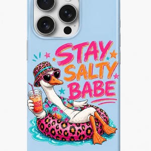 May include: A light blue phone case featuring a cartoon goose wearing sunglasses, a hat, and a Hawaiian shirt, relaxing on a pink leopard print floatie. The text "STAY SALTY BABE" is displayed in pink and orange.