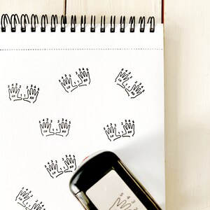 May include: A black and white self-inking stamp with the text "5 4 3 2 1 2 3 4 5 LH RH" and a graphic of two hands with numbered fingers.