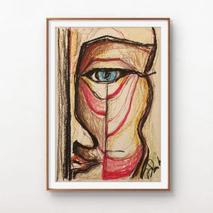 Puede incluir: Obra de arte abstracta de un rostro, enmarcada en un marco de madera. La obra presenta un ojo azul, con el rostro dividido en dos mitades. La paleta de colores incluye tonos de marrón, rojo y amarillo, con un fondo beige.