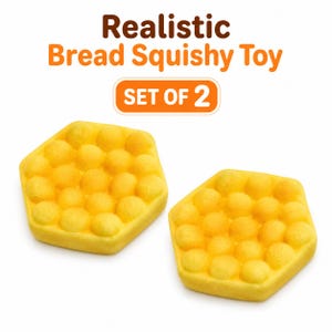 May include: Two yellow hexagonal squishy toys with a textured surface resembling bubble bread. The text Realistic Bread Squishy Toy SET OF 2 is displayed above the items in brown and orange lettering against a plain white background.