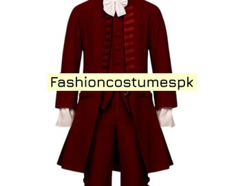 May include: A burgundy three-piece costume comprising a long coat, waistcoat, and trousers. The coat has decorative buttons and contrasting trim. A white cravat and cuffs complete the historical outfit. The text "fashioncostumespk" is visible.
