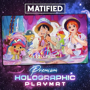 May include: A rectangular playmat featuring One Piece characters Luffy, Nami, and Chopper eating sweets at a table. The design includes the text MATIFIED, ONE PIECE CARD GAME, and Premium HOLOGRAPHIC PLAYMAT against a purple starry background.