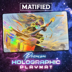 May include: A rectangular holographic playmat featuring a colorful illustration of a character from the game League of Legends. The playmat has the text "MATIFIED" at the top and "Premium Holographic Playmat" at the bottom.