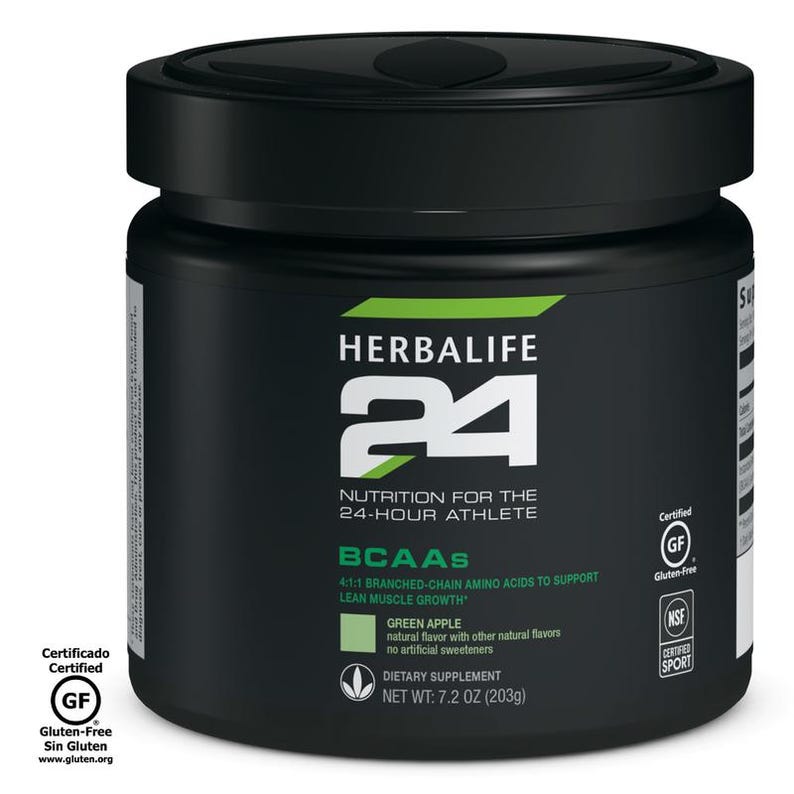 K&ouml;nnte beinhalten: Ein schwarzer Herbalife 24-Beh&auml;lter mit schwarzem Deckel. Das Etikett zeigt das Herbalife-Logo, die Zahl 24 und Text, der darauf hinweist, dass es f&uuml;r den 24-Stunden-Athleten bestimmt ist. Es enth&auml;lt BCAAs mit gr&uuml;nem Apfelgeschmack und ist glutenfrei. Nettogewicht: 203g.