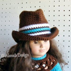 May include: A brown crocheted cowboy hat with white and turquoise stripes. The hat is worn by a doll with long brown hair.
