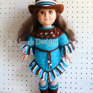 May include: A crocheted doll outfit in turquoise, brown, and white. The outfit includes a dress with fringe, a hat, and boots. The doll is wearing the outfit and has brown hair.
