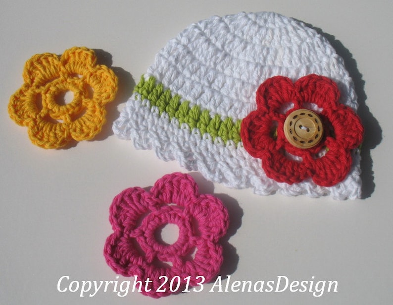 crocheted baby hats with flowers