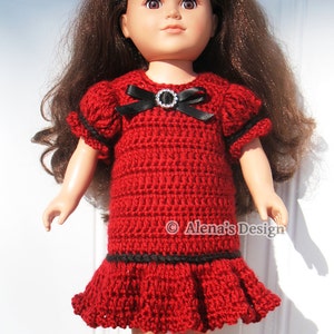 May include: A red crochet dress with black trim and a black bow with a rhinestone embellishment. The dress is designed for a doll.