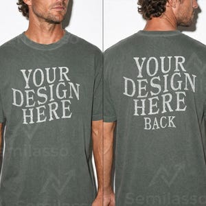 May include: A faded green t-shirt with the text "YOUR DESIGN HERE" on the front and back. The back of the shirt also has the word "BACK" below the main text. The shirt has a crew neck and short sleeves.