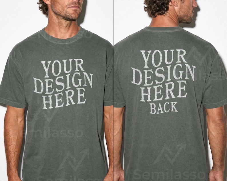May include: A faded green t-shirt with the text "YOUR DESIGN HERE" on the front and back. The back of the shirt also has the word "BACK" below the main text. The shirt has a crew neck and short sleeves.