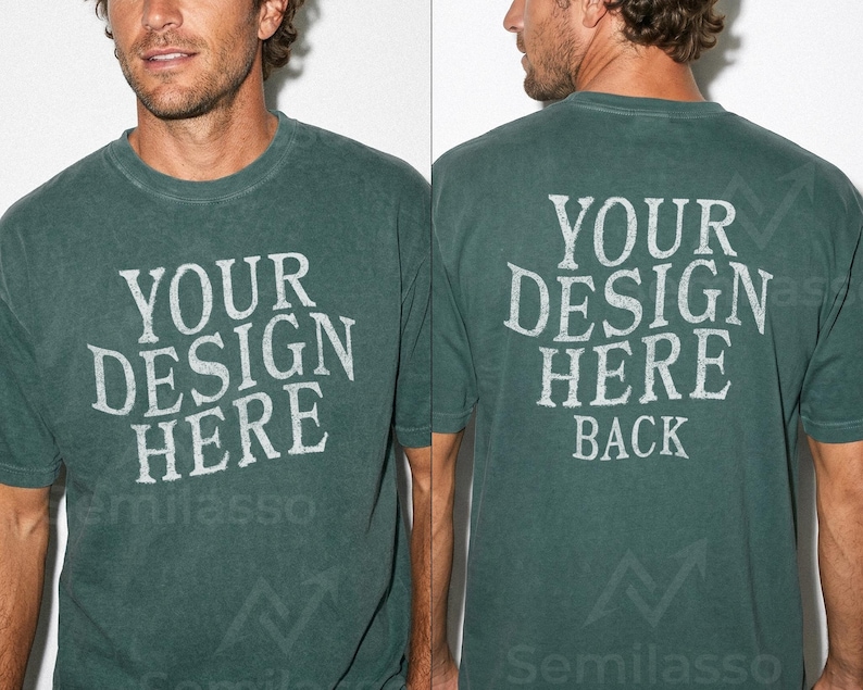 May include: A dark green t-shirt with the text "YOUR DESIGN HERE" printed on the front and back in a distressed white font. The shirt has short sleeves and a crew neck. The back of the shirt also says "BACK".