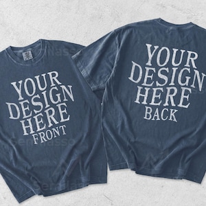 May include: Two dark blue t-shirts displayed together. The left shirt features the white text "YOUR DESIGN HERE FRONT" and the right shirt features the white text "YOUR DESIGN HERE BACK" in a distressed, weathered font style on the fabric.
