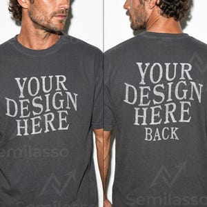 May include: Charcoal gray t-shirt with the text "YOUR DESIGN HERE" on the front and "YOUR DESIGN HERE BACK" on the back. The shirt has a classic crew neck and short sleeves. The design is in a distressed, vintage style.
