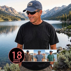 May include: A man wearing a black t-shirt, sunglasses, and a blue baseball cap with a patch. The image includes a circular graphic with the text "18 COLORS BUNDLE" and three smaller images of the same man in different colored shirts. The background shows a lake and mountains.
