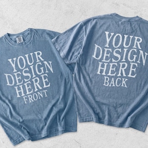 May include: Two blue short-sleeve t-shirts displayed together. The left shirt features white text reading YOUR DESIGN HERE FRONT. The right shirt features white text reading YOUR DESIGN HERE BACK. Both shirts have a crew neckline and a casual fit.