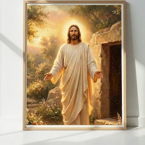 Puede incluir: Pintura enmarcada que representa una figura con una túnica blanca con los brazos extendidos, bañada por una luz dorada. La obra de arte está ambientada en un jardín con una estructura de piedra y flores. La pintura está en un marco de madera.