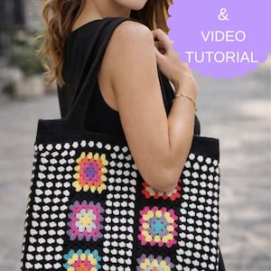 May include: Black and white crocheted tote bag with colorful floral squares. The bag has a solid black top and handles. The text "PDF & VIDEO TUTORIAL" is in a purple bubble in the upper right corner.