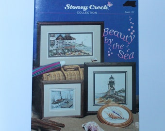 Stoney Creek Collection Beauty by the Sea Cross Stitch Pattern Book 137 - lighthouses, seashore, seascape, seagulls, seashells, sailboats