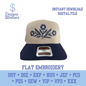 May include: A beige and navy blue baseball cap with a floral design embroidered on the front. The cap has a flat brim and the text "INSTANT DOWNLOAD DIGITAL FILE" is visible. The brand name "OTTO" is on the front.