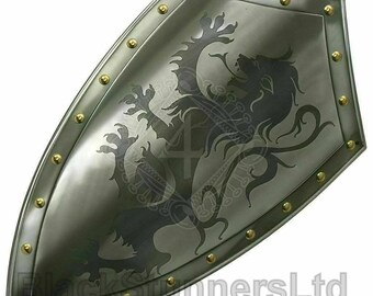 May include: A silver-colored shield with a black lion emblem. The shield has a curved shape with a border of gold-colored rivets. The shield has the text "BlackStannersLtd" at the bottom.