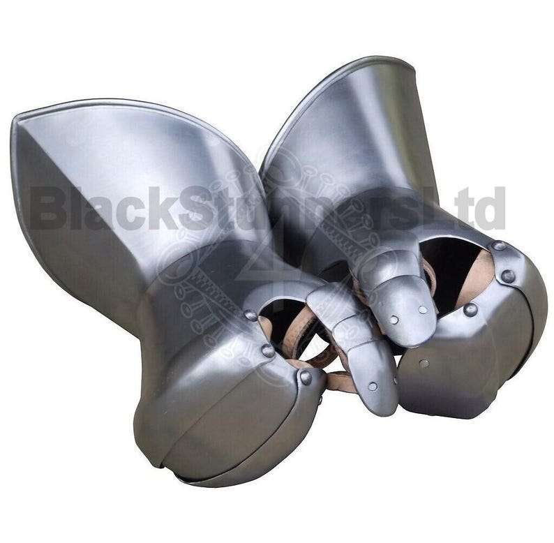 May include: A pair of silver-colored, articulated gauntlets, likely for historical reenactment or display. The metal gloves have a polished finish and are designed to protect the hands. The gauntlets are made of multiple plates, riveted together for flexibility and protection.