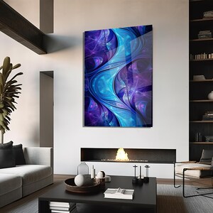 May include: Abstract wall art with a dynamic design in blue and purple hues. The artwork presents flowing, organic forms with a glossy finish, offering a contemporary aesthetic. It's mounted on a white wall, accentuating its visual appeal. The artwork is a decorative piece.