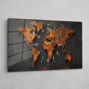 May include: A rectangular wall clock featuring a world map design with a rusty orange and black color scheme. The clock face is a circular design with white numbers and gold hands.