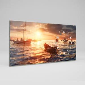 May include: A rectangular wall clock featuring a serene seascape with boats on the water at sunset. The clock face is superimposed over the image, with white numerals and hands. The overall color palette includes shades of orange, brown, and blue.