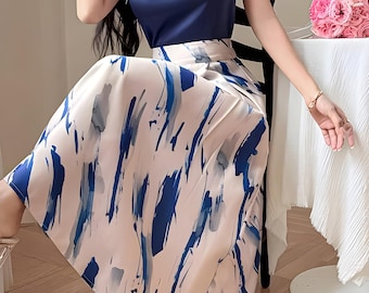 Ensemble haut élégant en satin bleu à col bénitier et jupe longue à imprimé artistique pour la Fête des Mères
