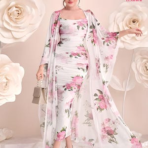 May include: A white floral print dress and matching long jacket. The dress is ruched and has a square neckline. The jacket drapes over the shoulders. The dress and jacket have a pink floral pattern. The image includes the text "LEARSPK" and "IMPORTED".