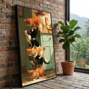 May include: A framed print depicts a stack of six kittens in a kitchen setting. The kittens are various colors, including orange, black, and gray. The print is displayed on a brick wall next to a potted plant and a window with a view of trees.