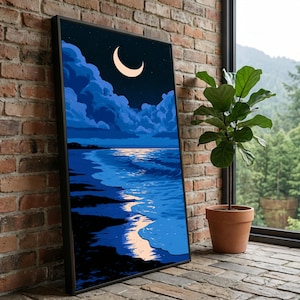 May include: A rectangular framed wall art print featuring a nighttime coastal scene with a crescent moon in a dark sky, deep blue clouds, and ocean waves washing onto a dark shoreline with a soft light reflection on the water surface.