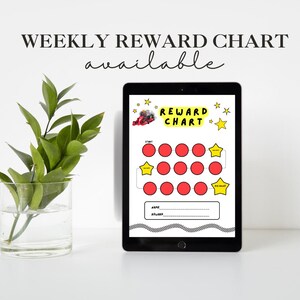 May include: A black tablet displays a "REWARD CHART" with red circles and yellow stars. The text "WEEKLY REWARD CHART available" is at the top. A glass vase with green leaves is on the left.